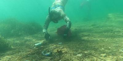 Bodrum'da sezonun son deniz dibi temizliğinde 200 kilogram atık çıkarıldı