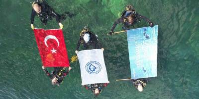 İş Bankası öncülüğünde Büyükada'da deniz dip temizliği